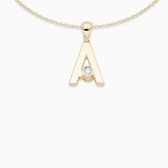 This sleek letter pendant has a sliding diamond that moves and catches the light.   Chain: This pendant comes with an 18kt yellow gold chain, the length of the chain is 16 inches. Available on FalenaFineJewelry.com or in-store